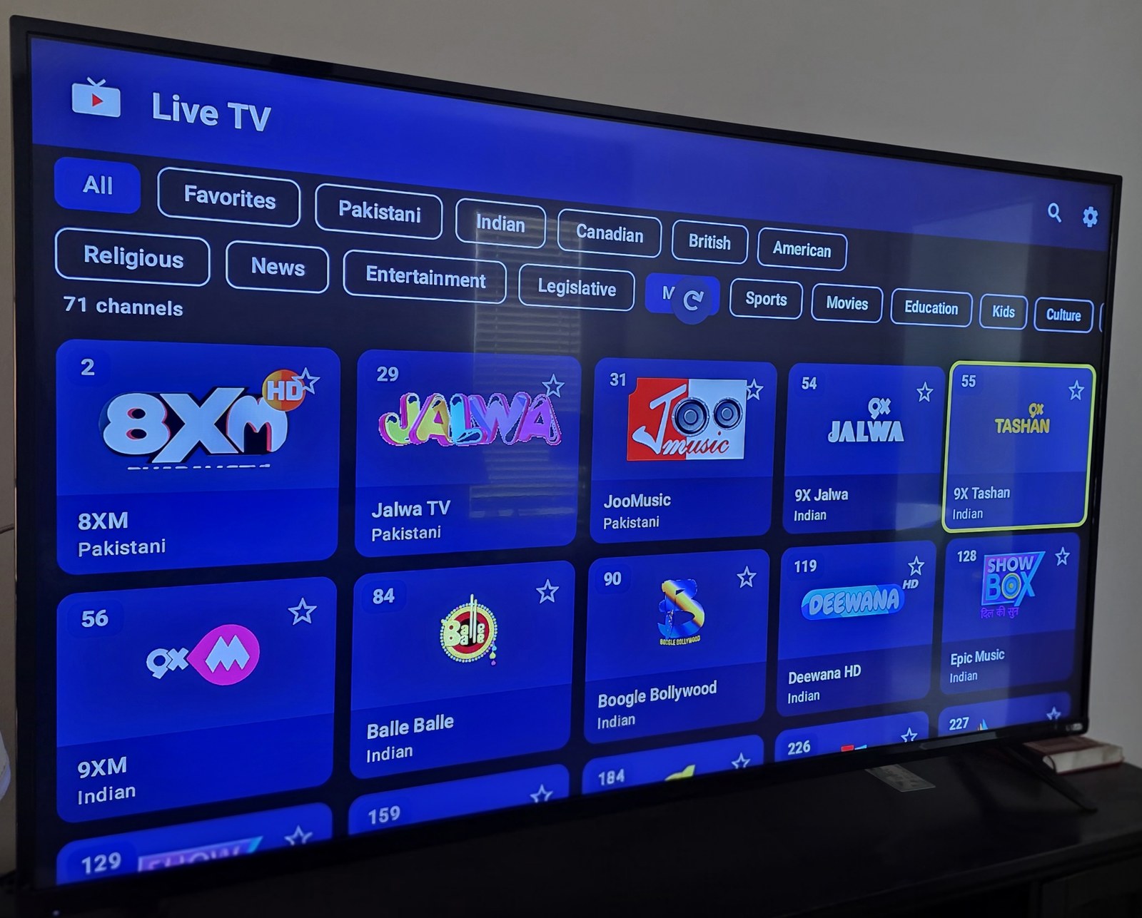 The Live TV app on a television, showing the channel list